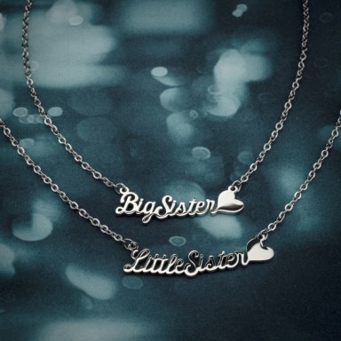 Pair of Little and Big Sister necklaces in stainless steel