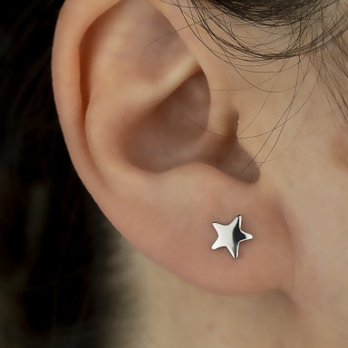 Single micro star earring in 925 silver