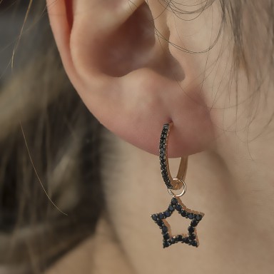 Single star earring in 925 rhodium silver with zircons