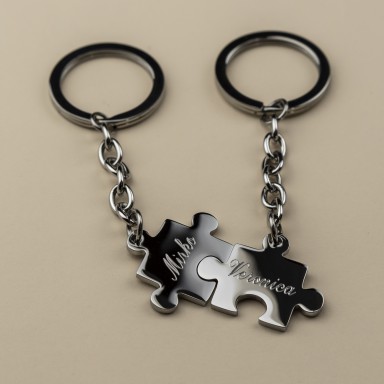 Pair of stainless steel puzzle keychains