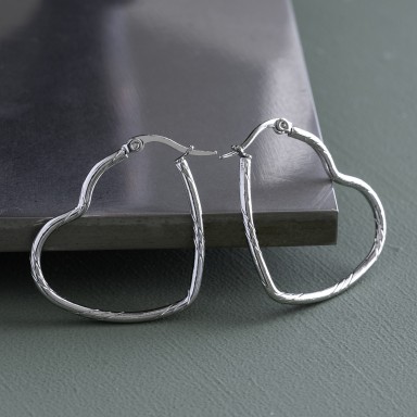 Pair of heart-shaped earrings in stainless steel