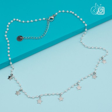 Girocollo perle e stelline in acciaio inox