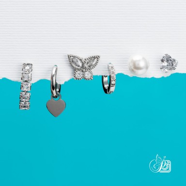 Set 6 orecchini "fantasy" in acciaio inox