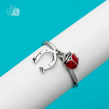 Anello regolabile coccinella e ferro di cavallo in acciaio inox